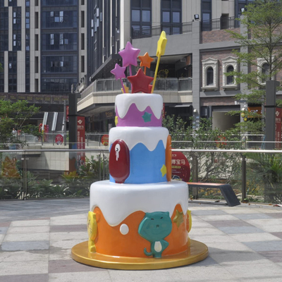 De Kleur van Art Outdoor Fiberglass Sculpture Painted van de cakelolly voor Venstervertoning
