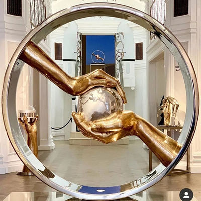 Hand Opgepoetst Spiegelroestvrij staal die de Aardebeeldhouwwerken bewaken